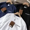 Hochwertiges Burberry Kurzarm-Shirt aus schwarzer Baumwolle mit Stickerei