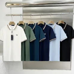 Luxuriöse Kurzarm-Freizeitkollektion aus weißer Seide von Fred Perry