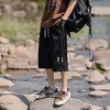 Premium Fila Shorts in Schwarz im Seidenstil