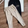 Hochwertige Nike-Hosen aus schwarzer Baumwolle mit Stickerei