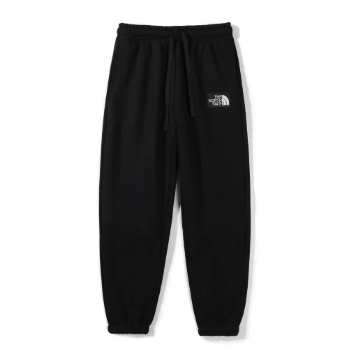 Luxuriöse Jogginghose von The North Face in Schwarz mit Stickerei