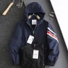 Moncler Mäntel in Premiumqualität, schwarzer Nylon-Stickerei-Stil