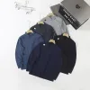 Bestseller Descente Langarm-Kollektion aus schwarzer Seide mit atmungsaktivem Design