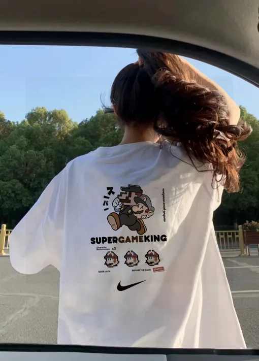 Bestseller: Nike Kurzarm-Shirt in Schwarz mit Baumwolldruck
