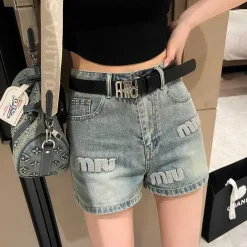 Hochwertige Miu Miu Shorts im Denim-Stil mit Stickerei