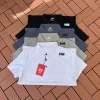 Luxus Helly Hansen Kurzarmhemden Schwarz Casual Kollektion