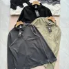 Hochwertiges Descente Langarmshirt aus schwarzer Baumwolle aus der Urban Collection