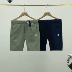 Hochwertige Descente-Shorts aus grünem Polyester der Urban Collection