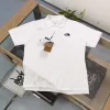Luxuriöses Kurzarmshirt aus schwarzer Baumwolle von The North Face aus der Classic Collection