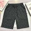 Hochwertige Louis Vuitton Shorts aus schwarzer Seide mit Logo-Kollektion