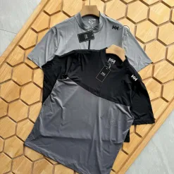 Luxuriöse, kurzärmelige Kollektion aus schwarzer Seide von Helly Hansen