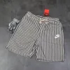 Luxuriöse Nike Kurzarm-Kollektion aus weißer Baumwolle mit Streifen
