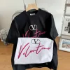 Hochwertiges Valentino Kurzarm T-Shirt Schwarz Leder Logo Style