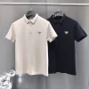 Bestseller Prada Poloshirt aus schwarzer Baumwolle mit Logo-Kollektion