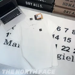 Bestseller The North Face Poloshirt aus schwarzer Baumwolle mit Logo-Kollektion