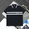 Hochwertiges Gucci Kurzarmhemd aus schwarzer Lederlogo-Kollektion