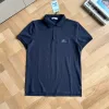 Hochwertige Burberry-Kollektion mit kurzen Ärmeln und schwarzer Baumwolle und Stickerei