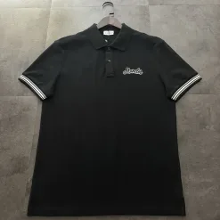 Premium Moncler Poloshirt aus schwarzer Baumwolle mit Stickereien