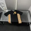 Hochwertige Burberry-Kollektion mit kurzen Ärmeln und Patchwork