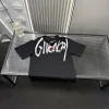 Hochwertiges Gucci Kurzarmhemd im schwarzen Logo-Stil