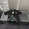 Premium Gucci Kurzarm-Kollektion mit schwarzem Print