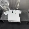 Hochwertige Prada Kurzarm-Kollektion aus weißer Baumwolle mit Logo