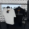 Luxus-Kollektion mit kurzen Ärmeln und weißem Strass von Louis Vuitton