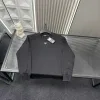 Bestseller Prada Langarmshirt im schwarzen Stil