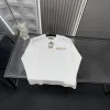 Hochwertiger Balenciaga Langarm-Stil mit weißer Stickerei