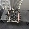Hochwertiger Gucci-Mantel in Schwarz mit Monogramm-Kollektion