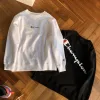 Luxus-Sweatshirts von Champion aus schwarzem Fleece mit Logo-Kollektion