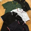 Hochwertige Kurzarm-Freizeitkollektion aus schwarzer Baumwolle von Fred Perry