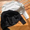 Hochwertige Prada Langarmshirts aus schwarzem Nylon der Classic Collection