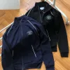 Premium Lacoste Mantel in Schwarz mit Stickerei