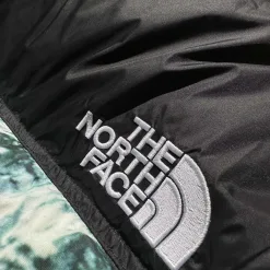 Luxuriöse Daunenjacke von The North Face im bestickten Stil aus weißem Nylon