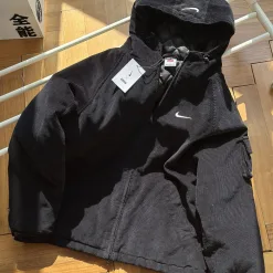 Hochwertige Nike-Jacken aus der Black Cotton Washed Collection