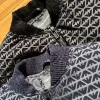 Bestseller: Armani Daunenjacke im schwarzen Print-Stil