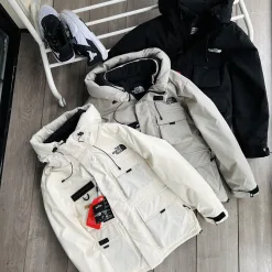 Bestseller The North Face Daunenjacken aus weißer Baumwolle im Logo-Stil