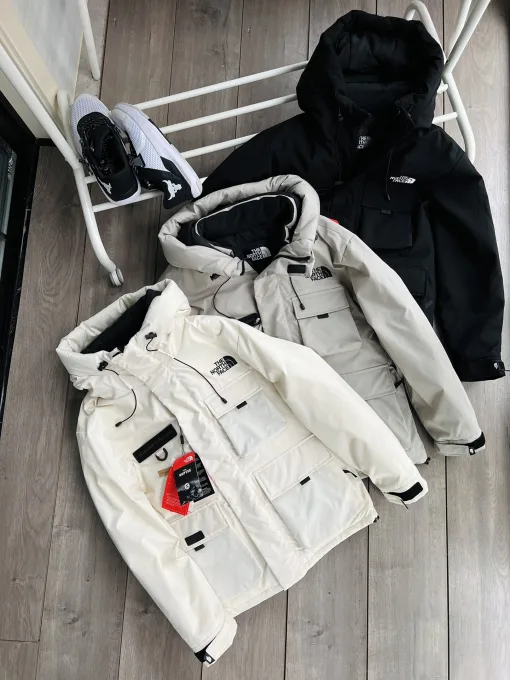 Bestseller The North Face Daunenjacken aus weißer Baumwolle im Logo-Stil