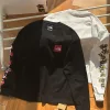 Luxus The North Face Langarmshirt aus schwarzer Baumwolle im Logo-Stil