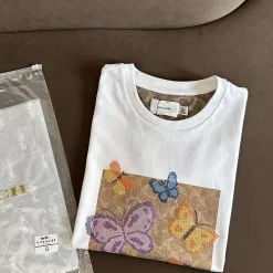 Coach Kurzarmhemden in Premiumqualität mit Strickdruck, Luxus
