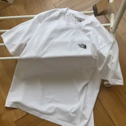 Bestseller The North Face Kurzarm-Kollektion mit weißem Baumwolldruck