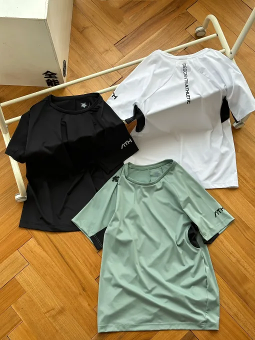 Bestseller Descente Kurzarm-Kollektion mit grünem Logo