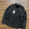 Hochwertige Balenciaga Langarm-Kollektion mit gelbem Logo