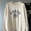 Luxus-Sweatshirts von Coach aus der Gray Chic Collection