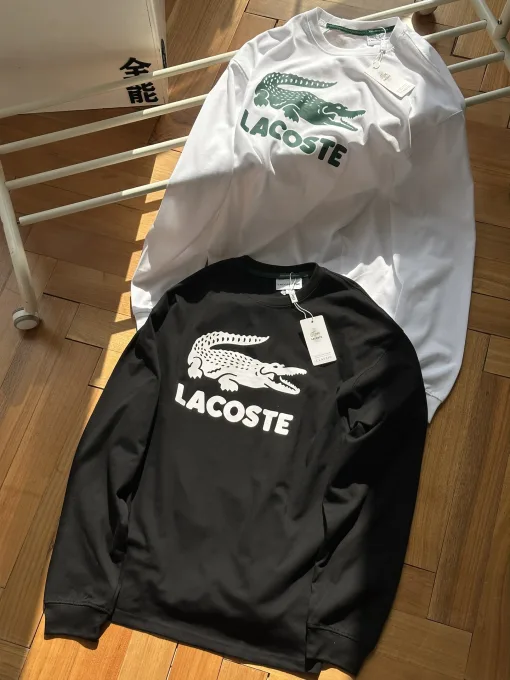 Luxuriöses Langarmshirt von Lacoste aus schwarzer Baumwolle mit Stickerei