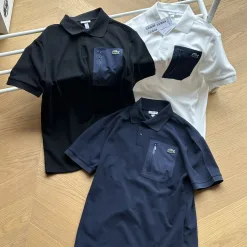 Hochwertiges Lacoste Kurzarm-Freizeitshirt aus schwarzer Baumwolle