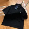 Bestseller: Fred Perry Kurzarmshirt aus schwarzer Baumwolle mit Stickerei