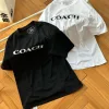 Luxus-Coach-Kollektion mit kurzen Ärmeln und schwarzem Logo