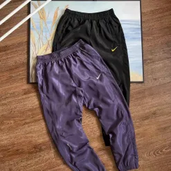 Luxuriöse Nike Cropped Pants Blaue Nylon-Atmungskollektion